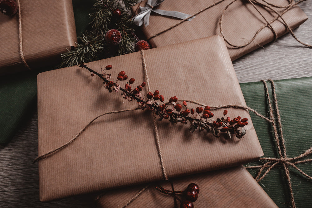 Package wrapped in paper with berries
